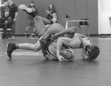 Dylan Geick ’17, who has committed to wrestle at Columbia University, pins Malik Beverly from Warren Township Highschool in the 2016 IHSA Regionals at Deerfield High School. 