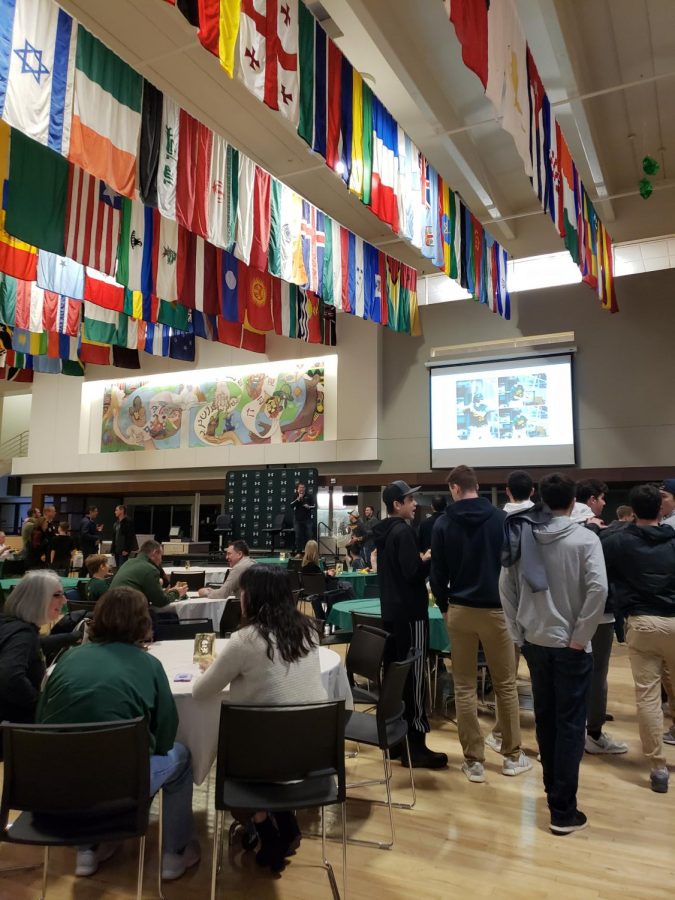 New head baseball coach Nick Skala reveals the winners of the raffle prizes at the end of Coach Swan’s special ceremony. Swan’s family, friends as well as former and current players and coaches attended the historic event and frequently congregated near the drawing’s potential rewards.