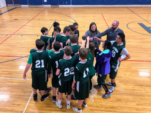 Coaches Degen and Hutchins rally the 2018-19 Allied Basketball team in a match earlier this season. The squad certainly demonstrated camaraderie and unity along their journey to third in State.
