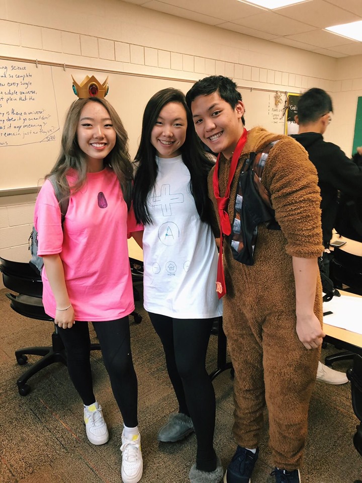 Katherine, Justin and Emmeline dress up for the NHS board theme!