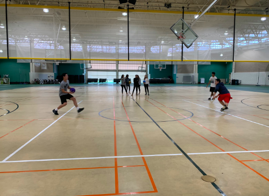 Students play an engaging game of dodgeball. Eight teams signed up to play on the October 19 tournament.