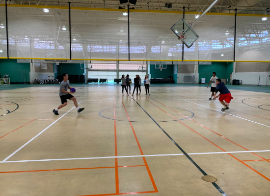 Students play an engaging game of dodgeball.  Eight teams signed up to play on the October 19 tournament.