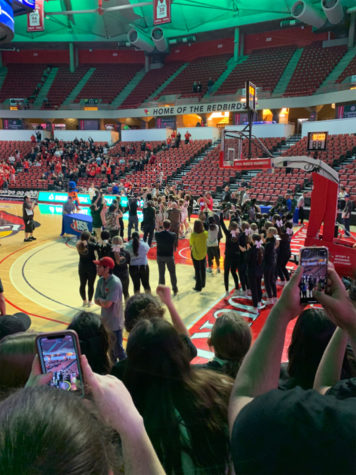 With a final score of 55-43, the Stevenson team rallies around their trophy as they are declared the state champions. After breaking the Stevenson record with 36 overall wins in the season, the athletes looked forward to post-game celebrations.