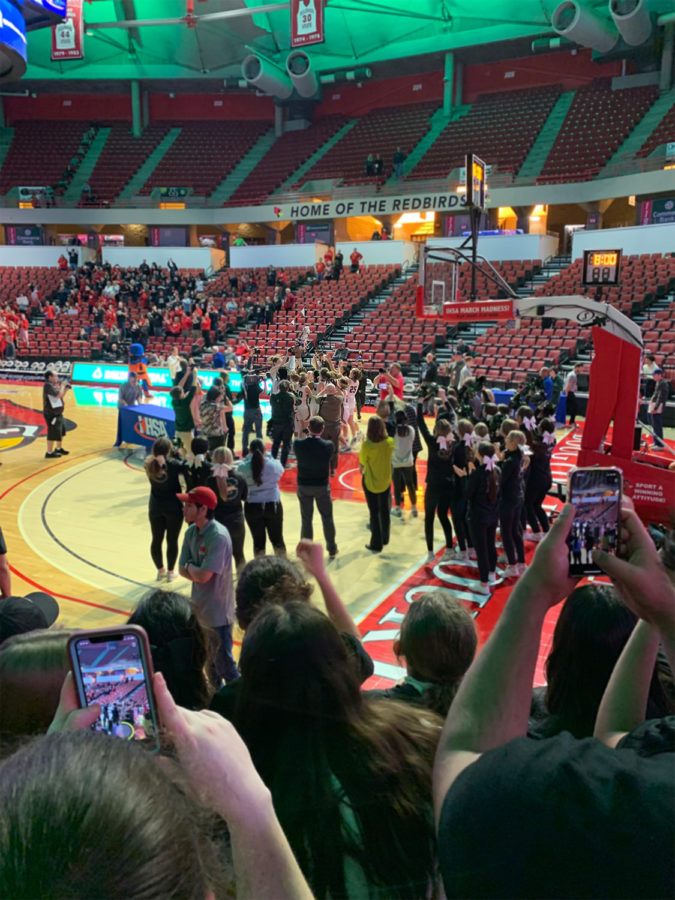 With a final score of 55-43, the Stevenson team rallies around their trophy as they are declared the state champions. After breaking the Stevenson record with 36 overall wins in the season, the athletes looked forward to post-game celebrations.