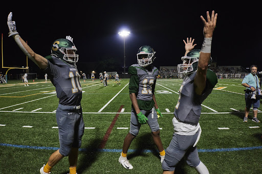 Ben Snider ’23 and Matt Projansky ’23 celebrate their third touchdown connection of the night. Snider totaled 236 yards on offense, including one 94-yard touchdown in the second quarter.