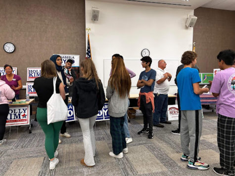 Students listen to Nabeela Syed during Political Action Club’s Campaign Night. Syed grew up attending public school in Palatine and has worked as a community organizer in the area.