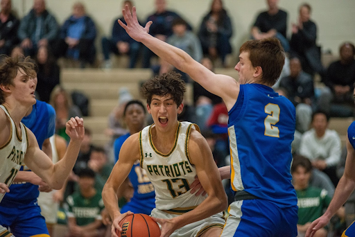 Jack Dabbs ’24 works in the post and shoots over Lake Forest defender Tommy Aberle, making the tough contested hook shot. Stevenson had a strong performance from the paint, scoring 33 of their 48 points in the paint.