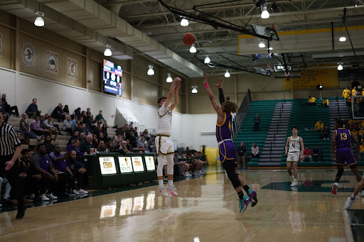 David Sulnius ’23 makes the first shot of the night five seconds into the shot clock. Sulnius had an efficient night, shooting a bolstering hot 75 percent from three and 66 percent from the field.