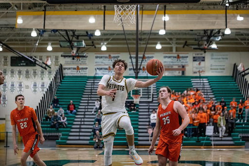 David Sulnius ’23 drives down the lane and scores a wide open layup. Sulnius was able to get the shots he wanted throughout the game, shooting an efficient 5-8 from the field.