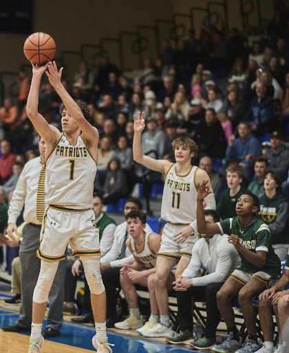 David Sulnius ’23 hits a three in front of the Stevenson bench which does their best impression of the Golden State Warriors’ bench. Stevenson was able to knock down several threes which ultimately put the momentum in their favor throughout the game.