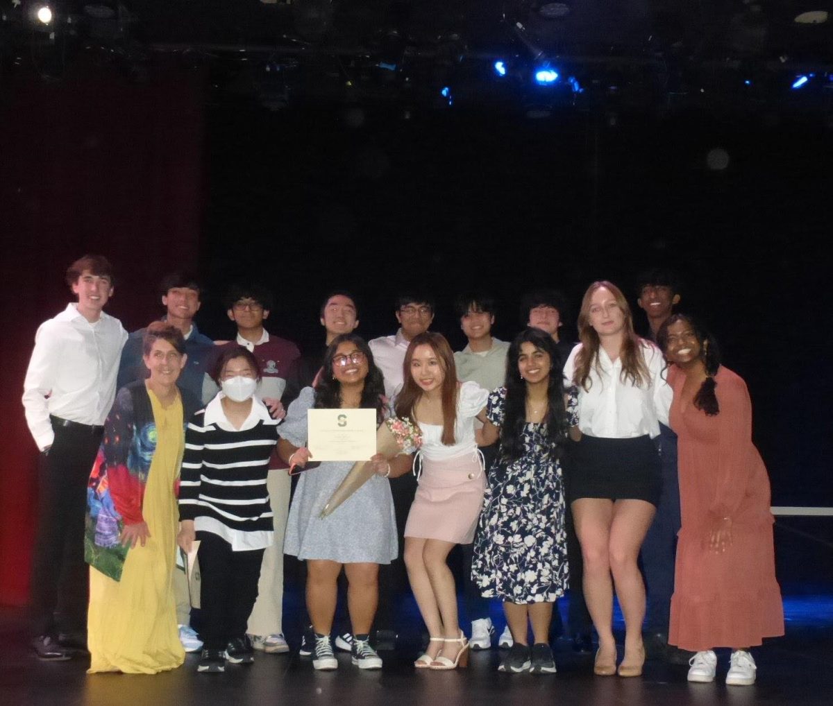 The newly appointed Senior Class Board executives stand for a group picture with their certificates and sponsor Jane Caballero. The newly appointed board will officially take over at the start of the summer.