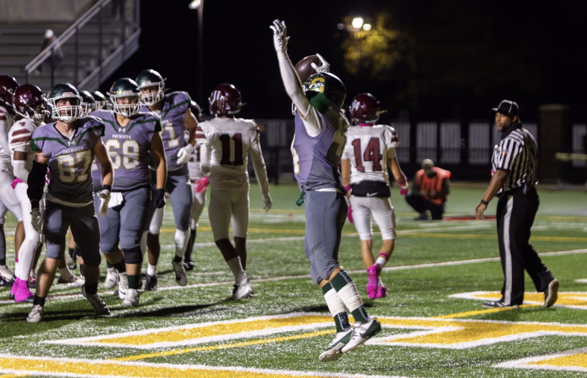 Aidan Elliott ’26 celebrates after scoring a touchdown. The offense was on fire tallying 5 touchdowns overall to take home the win. 
