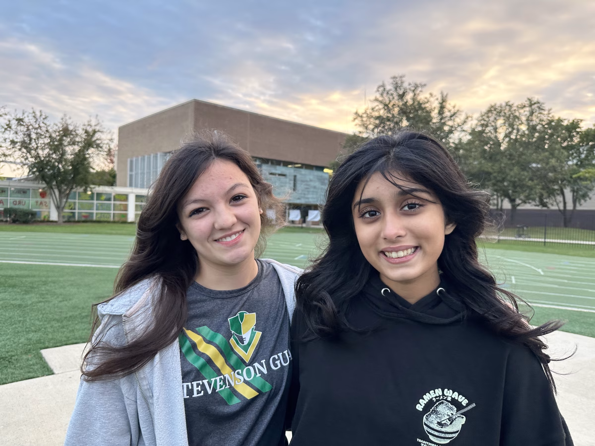 Shagun Talwar ’27, right, poses beside Caroline Alip ’26, left, at an October 2025 color guard practice. Alip was Talwar’s first captain during her freshman year, and now Talwar is a captain alongside her. 
